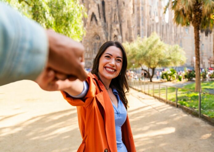 Multiracial beautiful happy couple of lovers dating in Barcelona