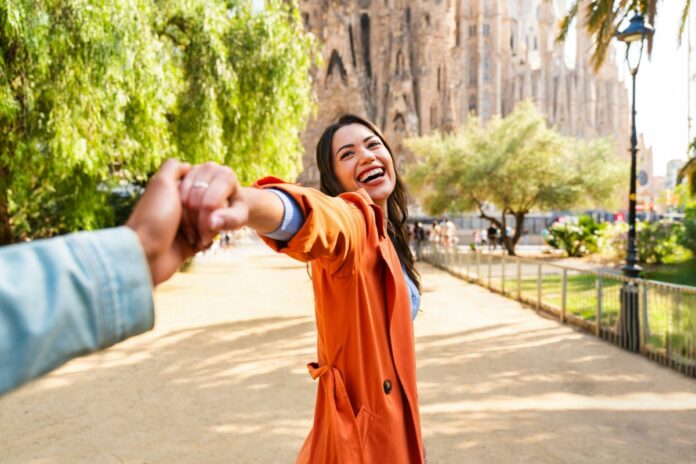 Multiracial beautiful happy couple of lovers dating in Barcelona