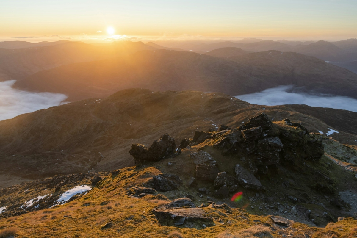 Scottish Highlands mountain landscape at sunset, taken when hiking up Ben Lomond in Trossachs Nation